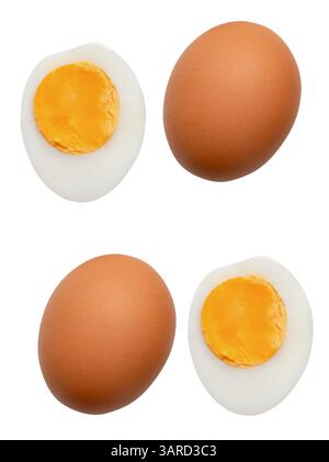 Top view set of two raw brown chicken eggs and two boiled or cooked eggs in two halves with egg yolk is isolated on white background. Stock Photo