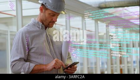 Image of data processing over caucasian male worker using smartphone Stock Photo