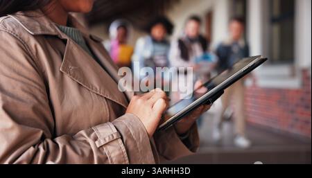 Education, hands and teacher with tablet, school and lesson planning on website for kids or app. Knowledge, educator and person with tech for schedule Stock Photo