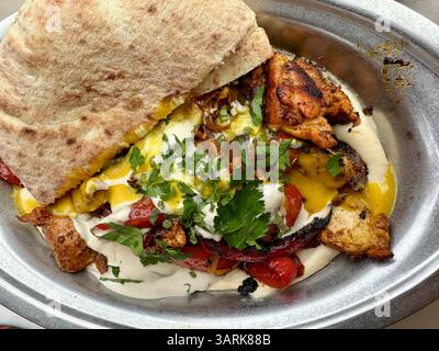 A meal at the Neni on the Naschmarkt in Vienna, Austria Stock Photo