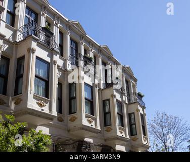 Facade and wrought iron balconies of a stylish French building Stock ...