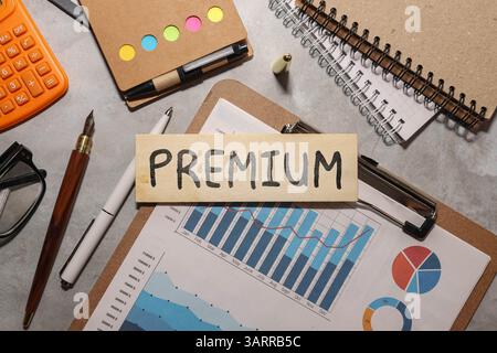 Letter block in word premium on wood background. Stock Photo