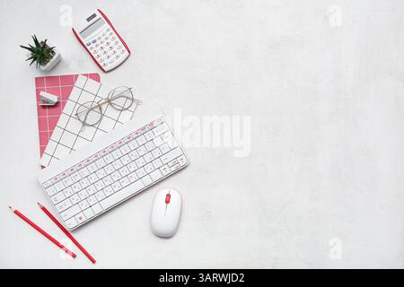 Composition with modern gadgets, stationery and eyeglasses on light background Stock Photo