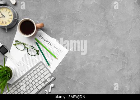 Composition with modern gadgets, financial documents, eyeglasses and cup of coffee on grunge background Stock Photo