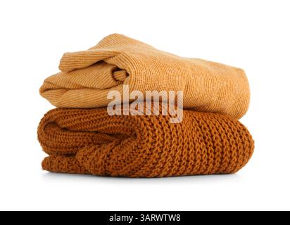 Stack of clean sweaters isolated on white background Stock Photo