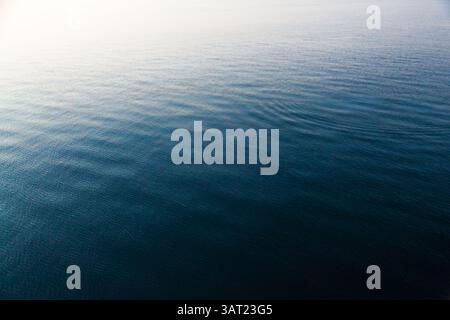 Calm sea with small ripples on the water. Stock Photo