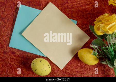 The colorful display, evoking spring festivals and seasonal celebrations, features vibrant yellow flowers, painted Easter eggs, and decorative cards. Stock Photo