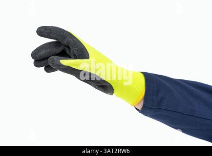 Close up of a handyman hand  with yellow and dark black glove and gesture of catching against a white background Stock Photo