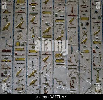 Stone wall with carved ancient Egyptian bas relief Stock Photo - Alamy
