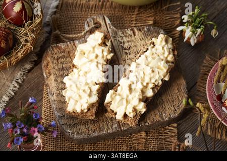 Two slices of bread with spread made of leftover Easter eggs Stock Photo