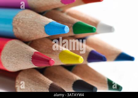 Sharpened colorful pencils macro closeup isolated on white Stock Photo