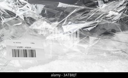 Transparent plasic foil surface background for packaging slides. Stock Photo