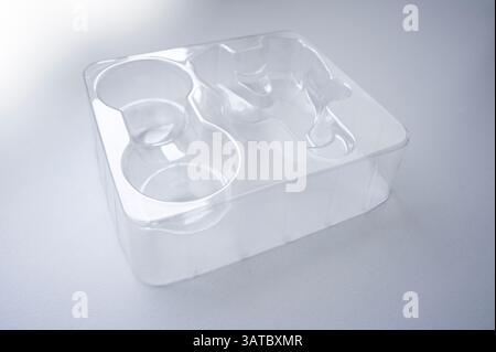 An transparent plastic pvc poly packaging box basket for goods to transport, Industry thermoforming mold package. Stock Photo