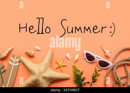 Sunglasses with seashells, starfishes and text HELLO SUMMER on orange background Stock Photo