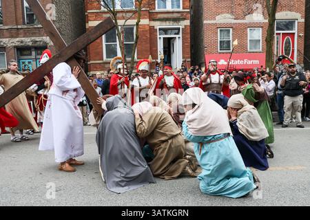 Chicago, USA. 18th Apr, 2025. The 8th Station of the Cross where Jesus meets the women of Jerusalem is re-enacted at the 48th Annual Via Crucis - Living Way of the Cross took place on Good Friday in the Pilsen neighborhood of Chicago on April 18, 2025. This is a reenactment of the 14 stations of the cross which brings thousands to Chicago Pilsen's neighborhood. (Photo By: Alexandra Buxbaum/Sipa USA) Credit: Sipa USA/Alamy Live News Stock Photo