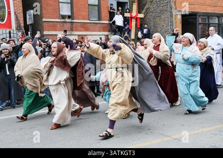 Chicago, USA. 18th Apr, 2025. The 8th Station of the Cross where Jesus meets the women of Jerusalem is re-enacted at the 48th Annual Via Crucis - Living Way of the Cross took place on Good Friday in the Pilsen neighborhood of Chicago on April 18, 2025. This is a reenactment of the 14 stations of the cross which brings thousands to Chicago Pilsen's neighborhood. (Photo By: Alexandra Buxbaum/Sipa USA) Credit: Sipa USA/Alamy Live News Stock Photo