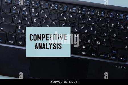 text caption presenting competition analysis on page. Stock Photo