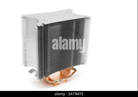 Powerful lamellar (multi ribbed) cooler for computer central processor unit over white background, shallow DOF, focus on the ribs Stock Photo