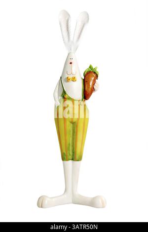 Figure of an Easter bunny with carrot - isolated on white background Easter bunny with carot - isolated on white background Stock Photo