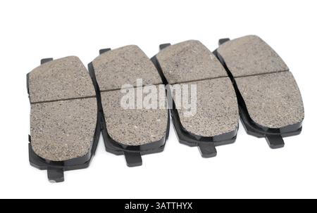 A full set of brake pads over white background Stock Photo