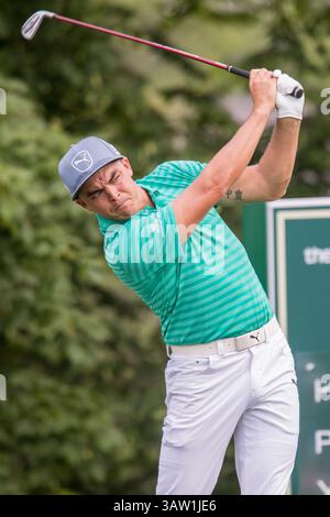 Rickie Fowler hits from the first fairway during the final round of the