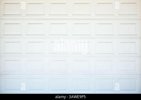 A view of a white painted garage door, as a background. Stock Photo