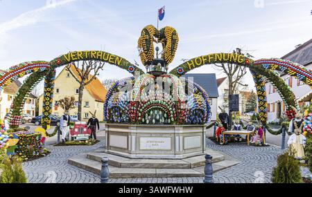 The Easter fountain in Schechingen has around 13, 000 hand-painted eggs. This makes it one of the largest and most beautiful in the whole of East Wuer Stock Photo