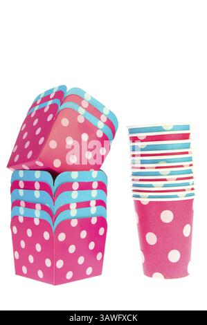 Stacked carton boxes and mugs in pink and blue Stock Photo