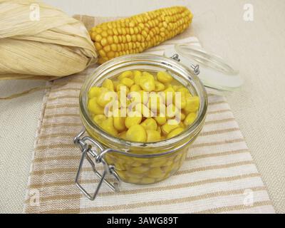 Cooked corn kernels in a jar Stock Photo