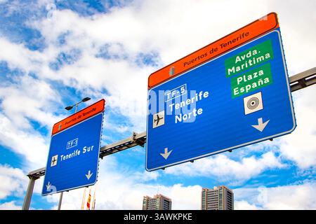 port overhead gantry direction road signs in santa cruz tenerife spain for tenerife norte sur TF5 TF1 Stock Photo