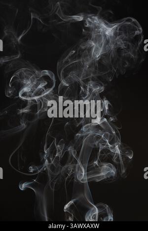 Smooth smoke cloud abstract on black background Stock Photo