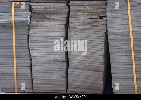 Warehouse of poured concrete paving slabs prepared for transport or laying Stock Photo