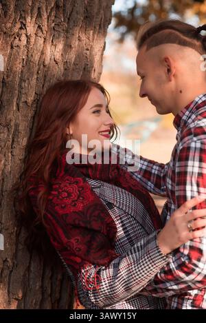 young couple in love walking and having fun in autumn park Stock Photo