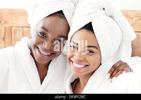 Pretty african women having ladies day at home Stock Photo