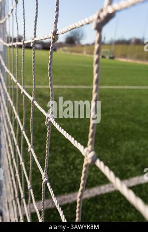 Close up details on an amateur soccer pitch in Scotland on a sunny spring morning Stock Photo