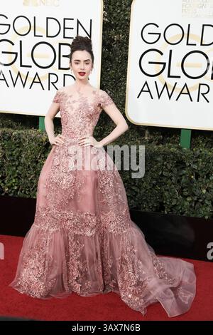 Lily Collins arrives at the 74th annual Golden Globe Awards at the Beverly Hilton Hotel on Sunday, Jan. 8, 2017, in Beverly Hills, Calif. (Photo by Jordan Strauss/Invision/AP Stock Photo