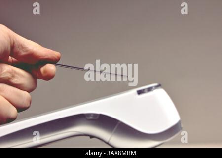 Close up female hand holds template mockup Bank credit card with online service isolated on grey background Stock Photo