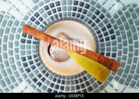 Top View of a Glass of Iced Apple Cinnamon Tea Stock Photo
