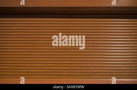 Shop or garage shutter. Retractable shutter Stock Photo