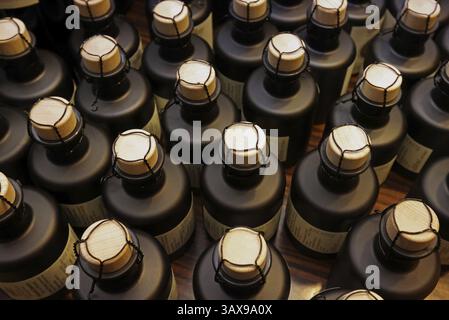 Small bottles, sealed with corks and wire Stock Photo
