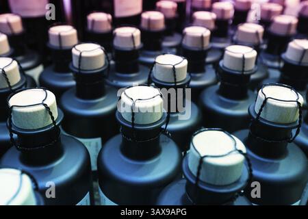 Small bottles, sealed with corks and wire Stock Photo