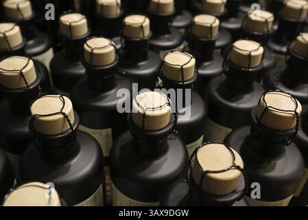 Small bottles, sealed with corks and wire Stock Photo