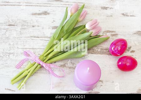 Bunch Of Pink Tulips With Candle On Rustic Wooden Background Stock ...