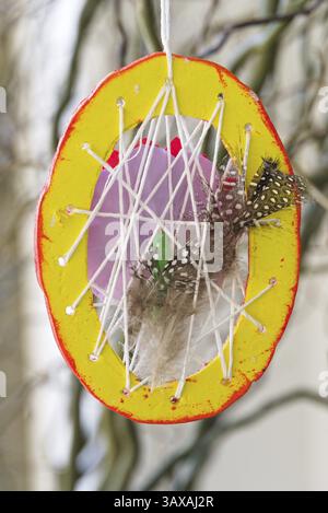 Creative and decorative homemade Easter egg - DIY Stock Photo