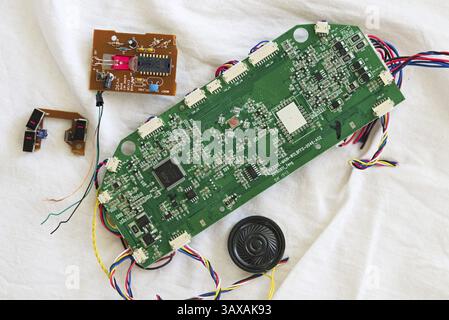 Circuit board with capacitors, microchip, circuits, resistors - Electronics close-up Stock Photo