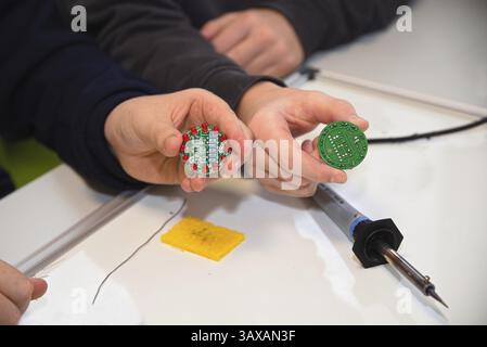 Light-emitting diodes soldered by electrical engineers - Electronic components and technicians Stock Photo