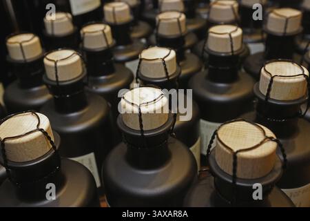 Small bottles, sealed with corks and wire Stock Photo