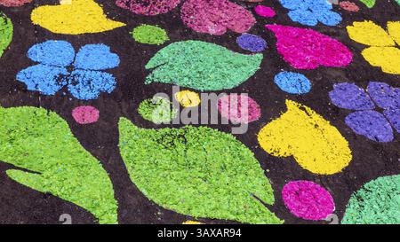 The coloured drawings on the ground, useful for background Stock Photo