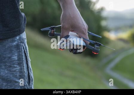 Man with a drone in his hand - detail flying drone Stock Photo