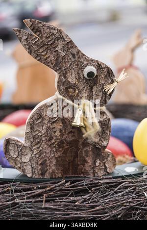 Creative Easter nest with wooden Easter bunny - homemade Easter decorations Stock Photo